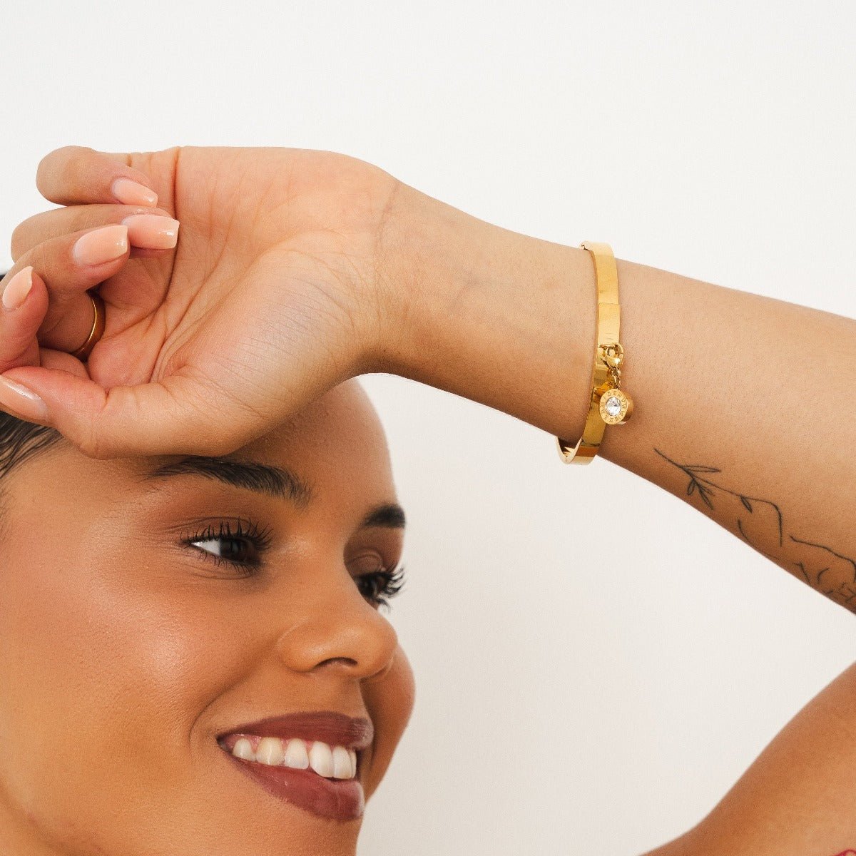 Pulsera Uniq bañada en oro de 18 quilates