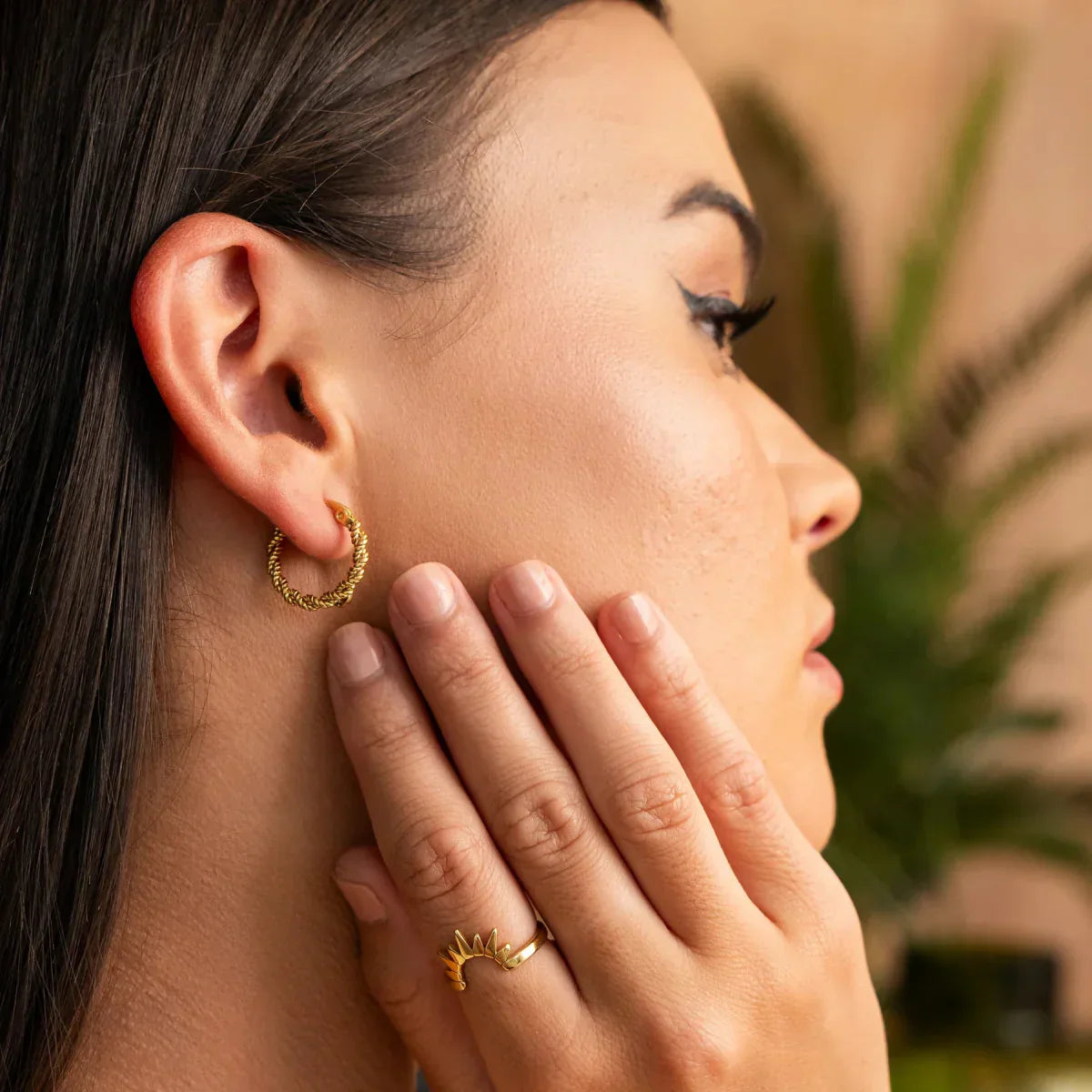 Pendientes de aro giratorios bañados en oro de 18 quilates