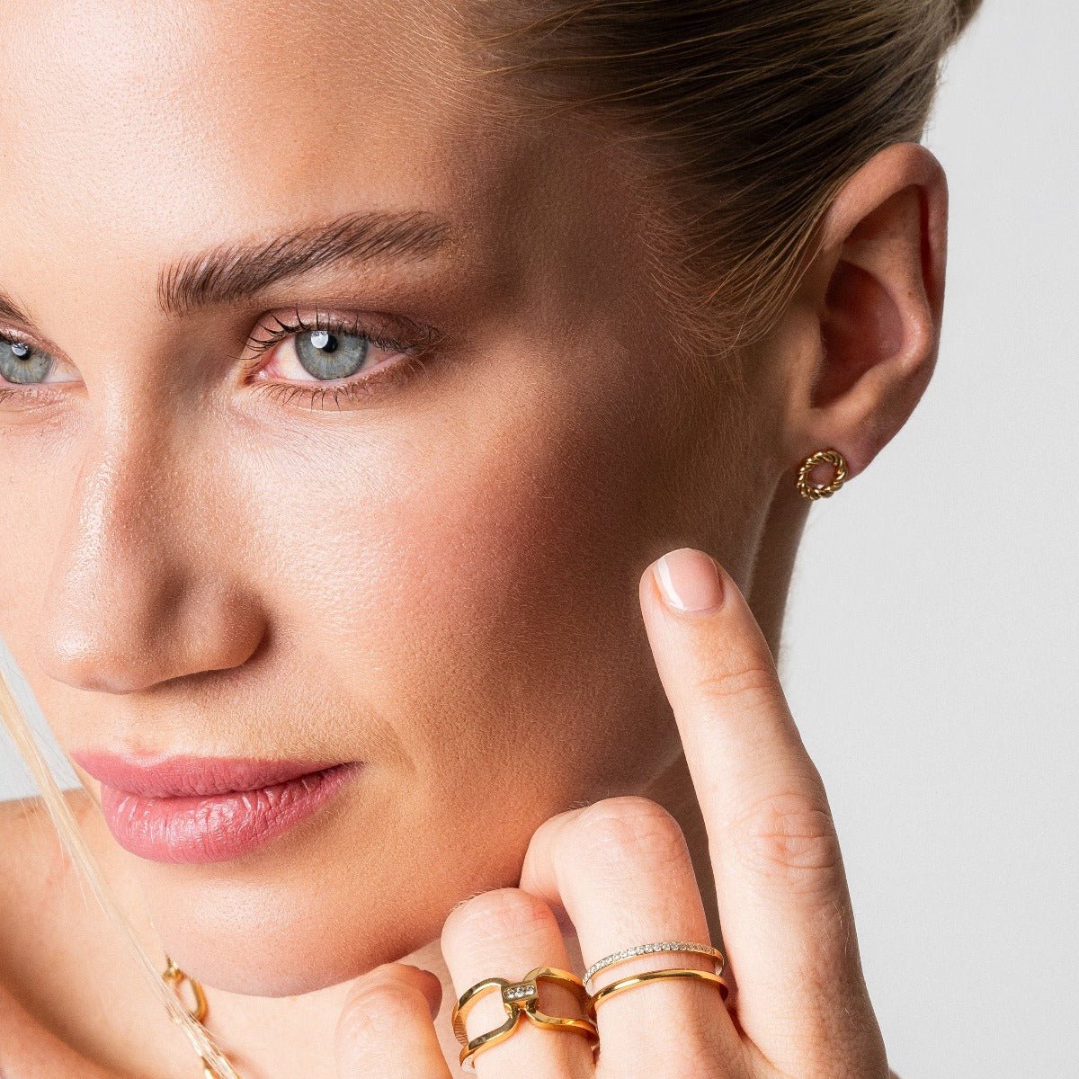 Pendientes Twist bañados en oro de 18k